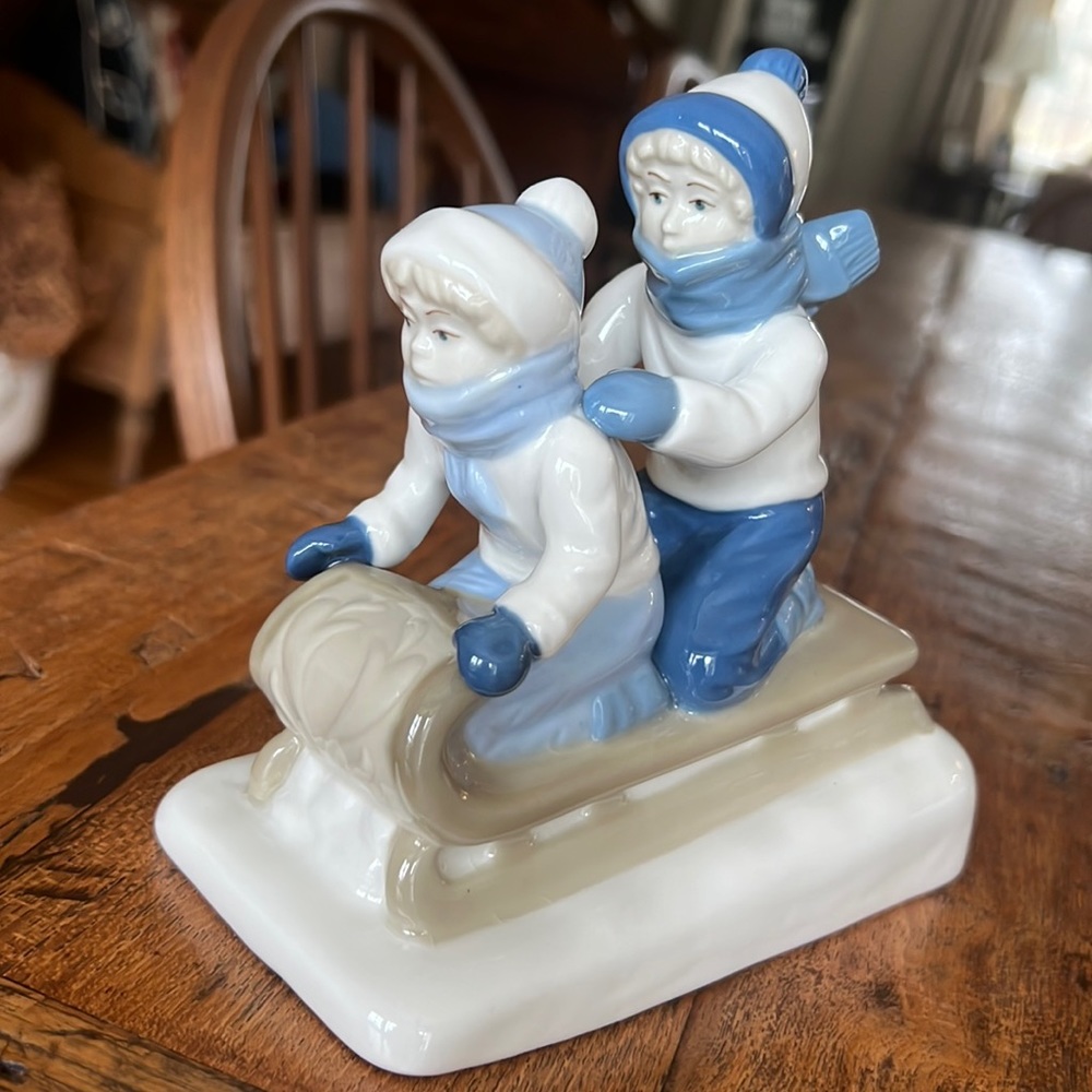 Children Sledding Porcelain Figurine- Paul Sebastian
